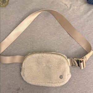 Lululemon Plush Shearling Waist Bag in Cream